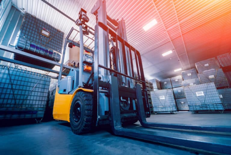 Still forklift in a warehouse to represent SynTech business