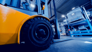 Yellow Forklift in warehouse - Safety Tips for Workplace Safety