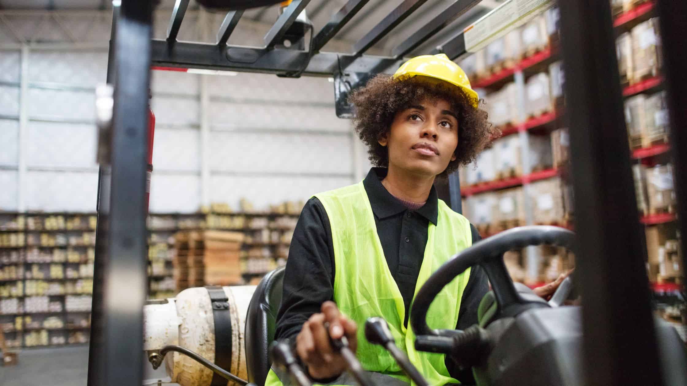 woman driving a forklift