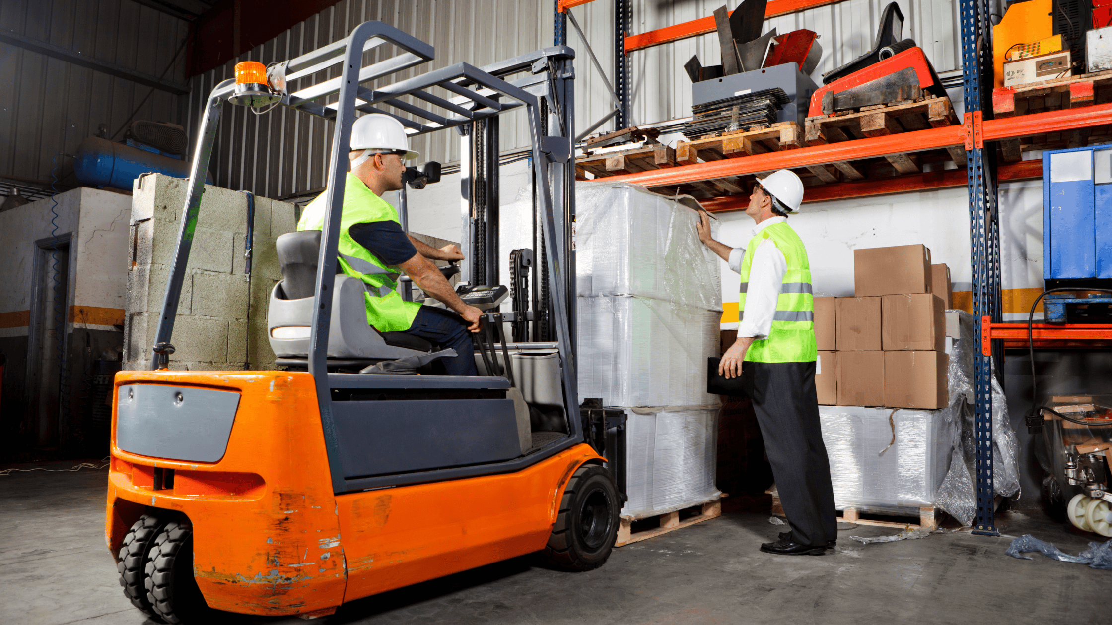 Two men working with Forklift Certifications